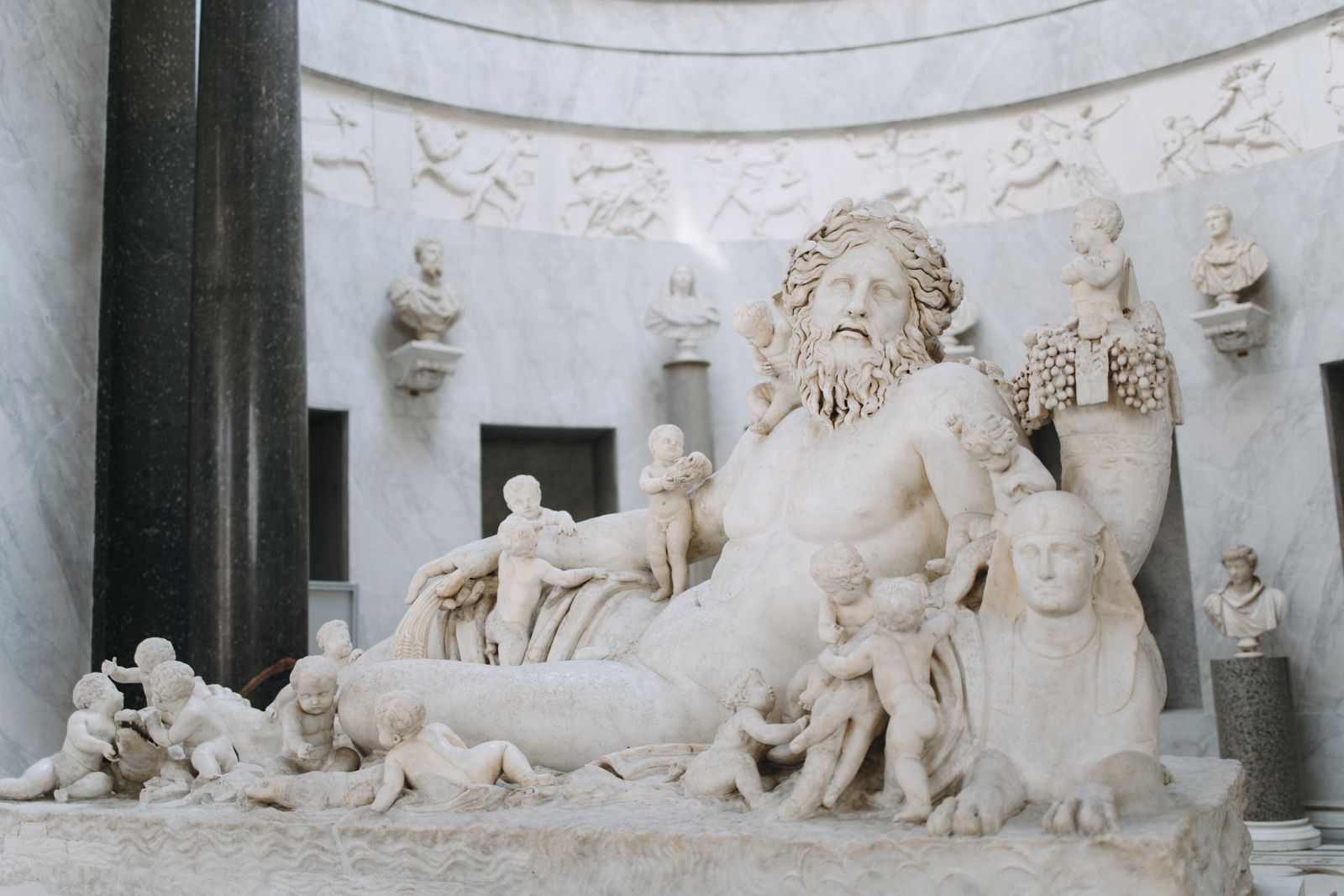 A classical marble sculpture in a museum hall
