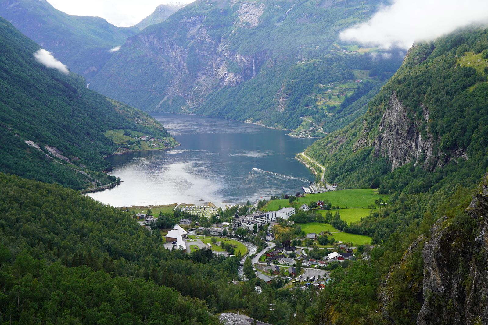 Sheer cliffs and waterfalls rising from the Geirangerfjord